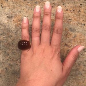 Women’s gold and burgundy cocktail ring